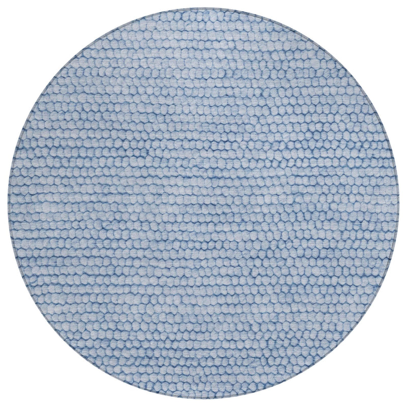 Light and medium blue round area rug with dense looped pebble texture.