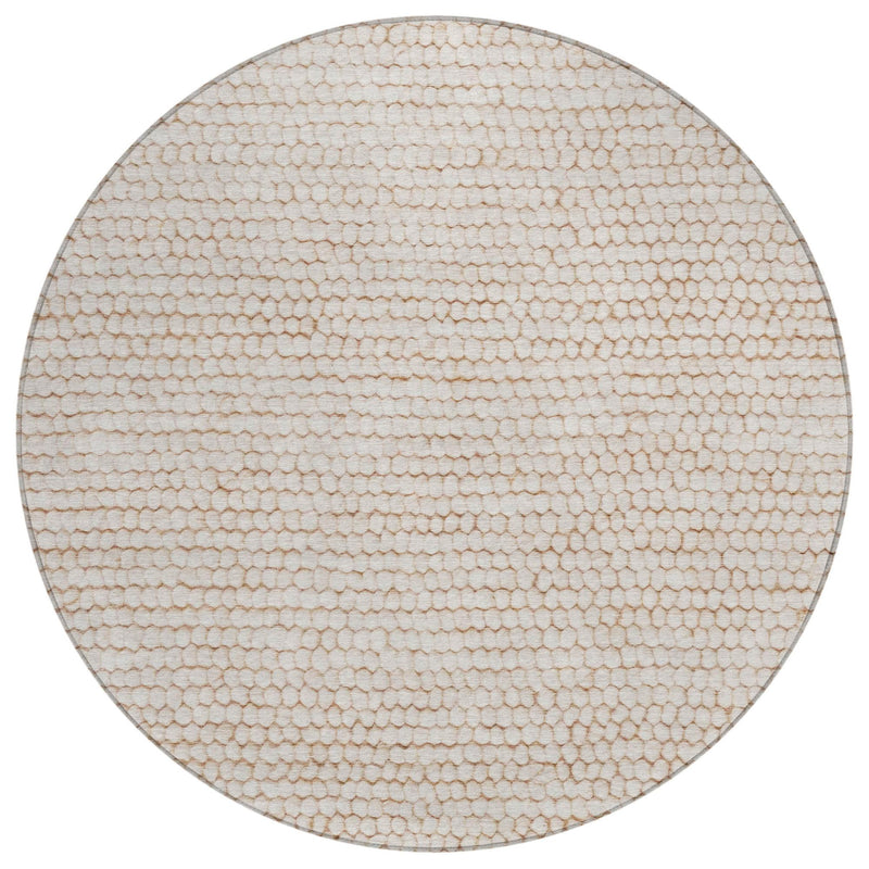 Ivory round area rug with textured surface, top view