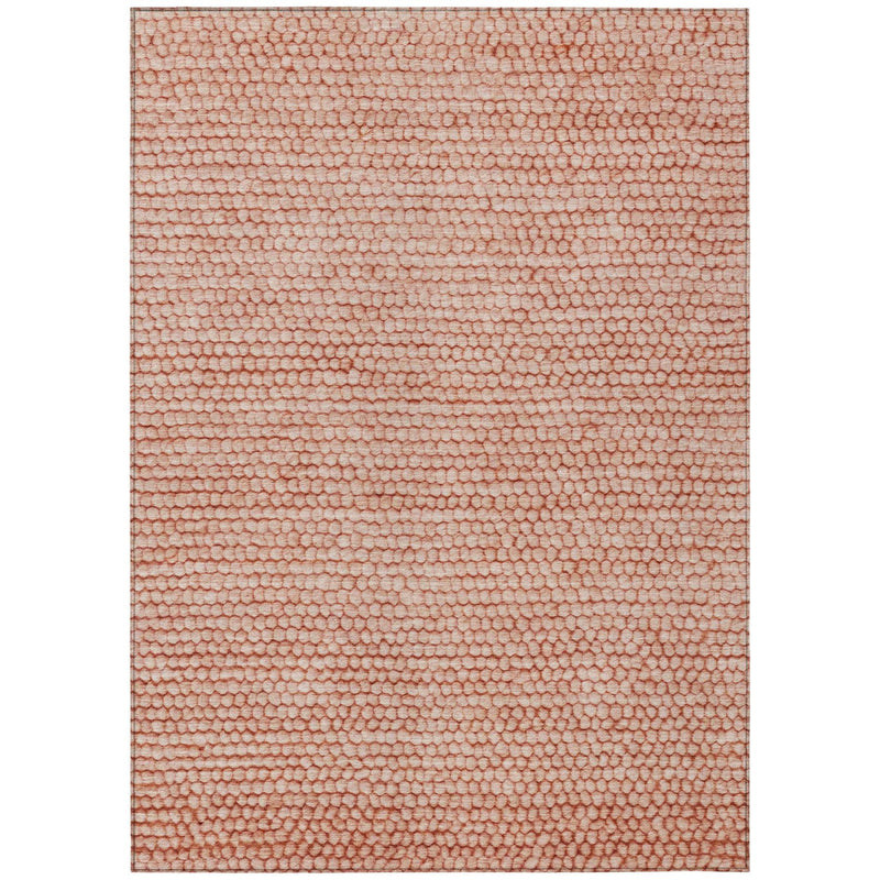Orange and salmon textured area rug with repeating pebble pattern, rectangular