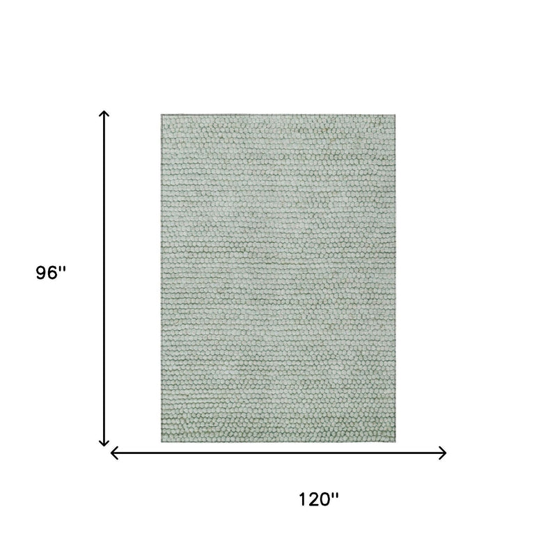 Rectangular green and blue textured area rug size 8 ft by 10 ft