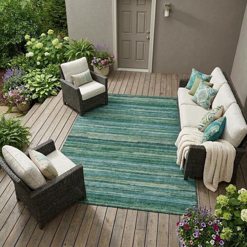 Teal blue and green striped indoor-outdoor area rug with thin horizontal line pattern.