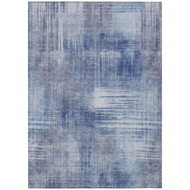 Blue abstract area rug flat view with distressed brushstroke design