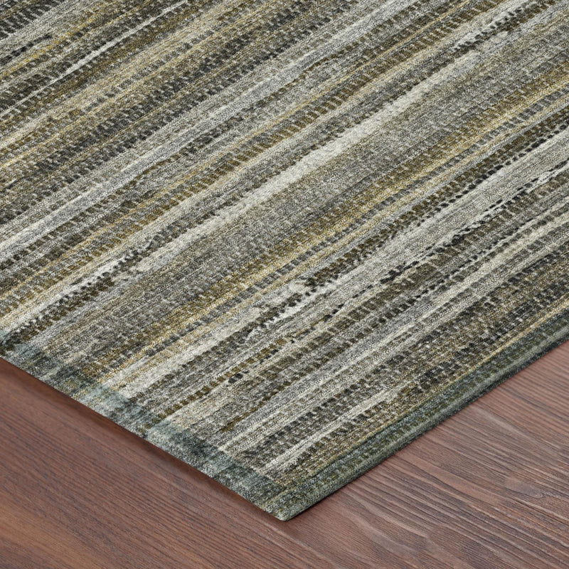 Corner close-up of pewter and gray striped area rug with textured flatwoven fibers
