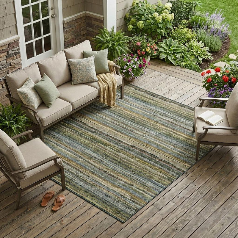 Striped indoor outdoor area rug with green, blue, tan, and dark brown stripes