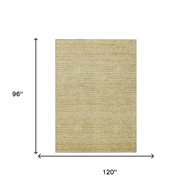Area rug in gold and wheat, size 96 in x 120 in, textured loop pile surface.