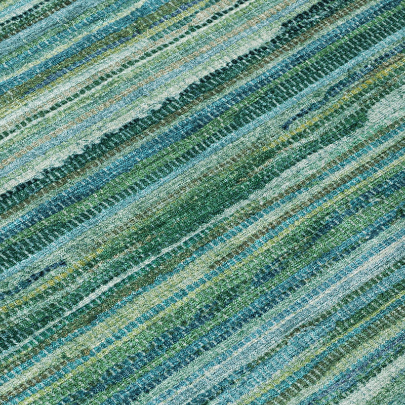 Detail view of teal and green striped area rug texture and woven look