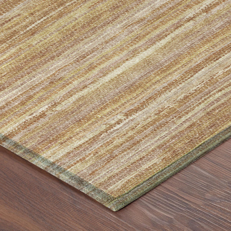 Corner view of round rug with orange, copper, and cream horizontal stripes and slim border