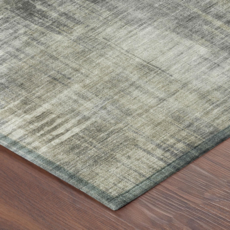 Gray and pewter abstract wash area rug corner, flatwoven texture and clean edge