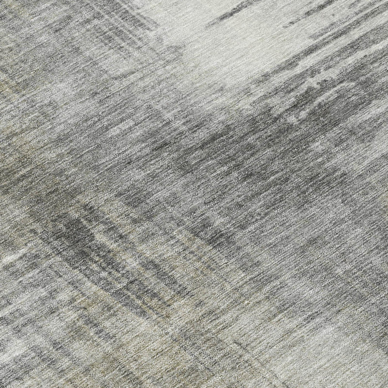 Gray and pewter abstract wash area rug, close-up of distressed woven texture