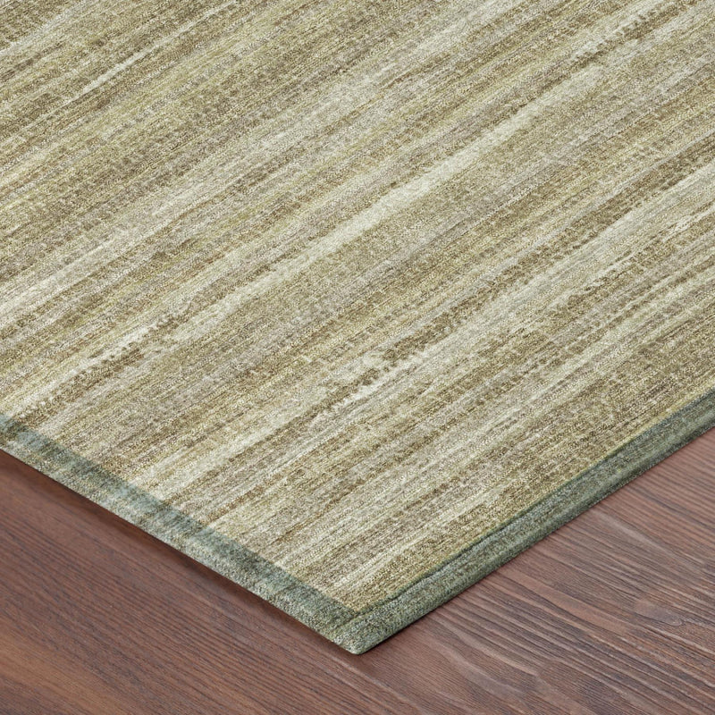 Corner view of tan and brown striped area rug with flat weave and darker edge
