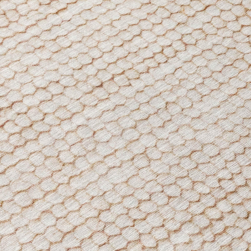 Ivory area rug close-up with interlocking loop pattern and tan-lined detailing