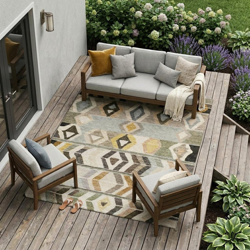 Indoor/outdoor area rug with geometric diamond and stripe pattern in gray and cream