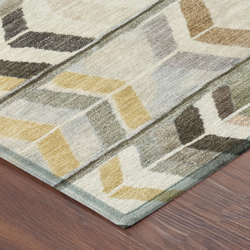 Corner view of tribal area rug with gray and cream geometric pattern with muted yellow