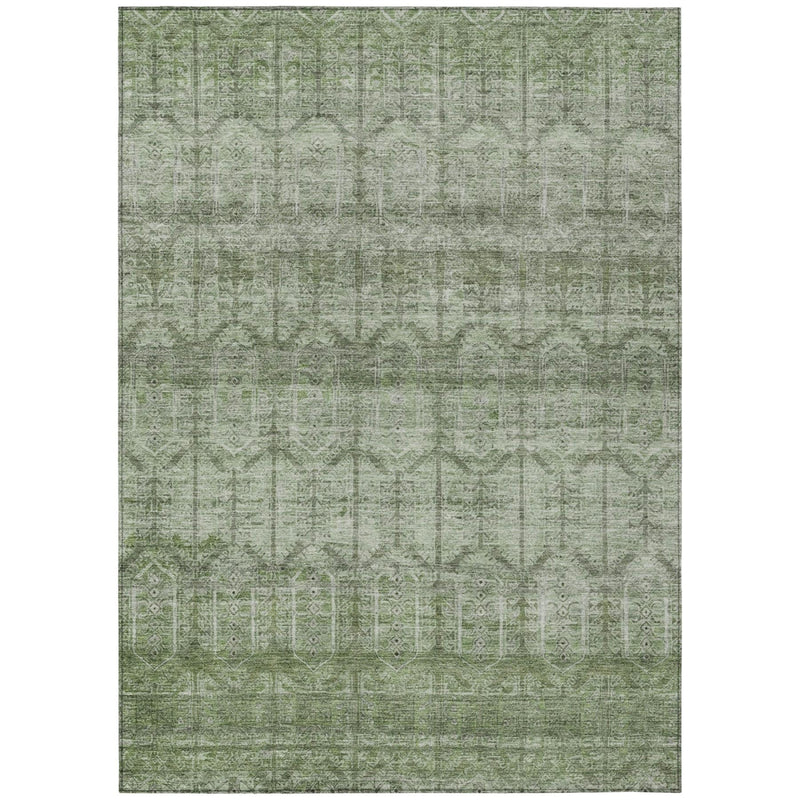 Sage green area rug with tribal geometric motif pattern and thin border