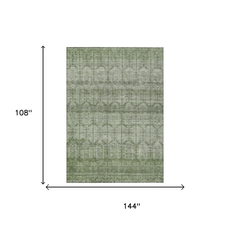 Sage green area rug, 108 in by 144 in, tribal geometric pattern with distressed wash