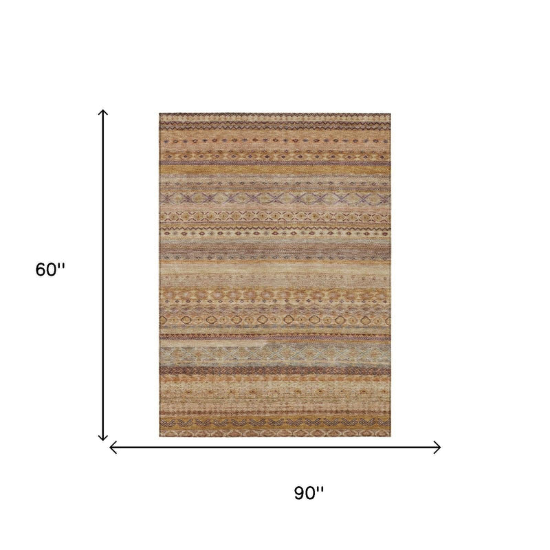90x60 inch orange and copper striped area rug with layered geometric bands