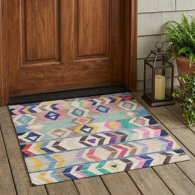 Geometric tribal area rug in multicolor with blue border and diamond and chevron design