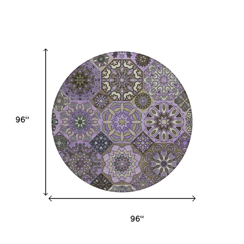 96 in round patchwork area rug with purple and graphite geometric design