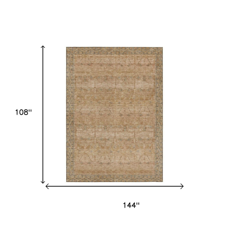 Tan indoor outdoor area rug, 108 x 144 in, worn geometric tribal design