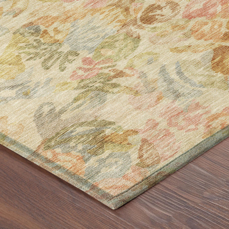 Multicolor distressed floral area rug with soft peach, orange, green, and blue tones