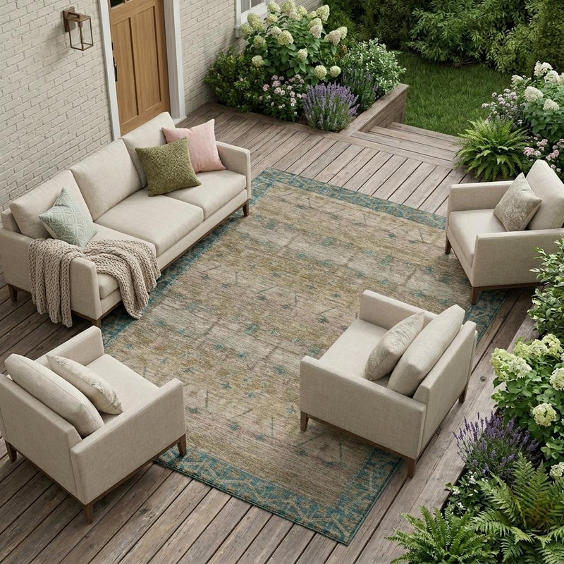 Taupe and teal tribal area rug on an outdoor patio