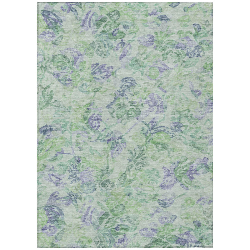 Floral area rug with mint green base and blue-purple vine motifs, soft silvery border