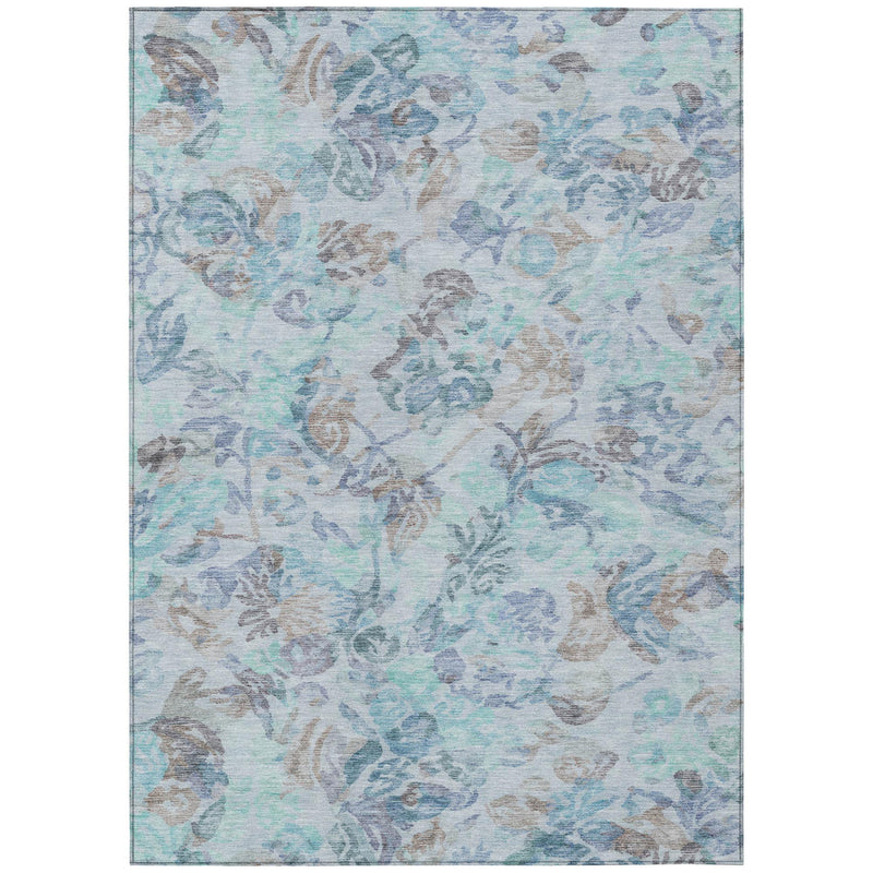 Light blue floral area rug with teal, silver, and brown distressed pattern, border
