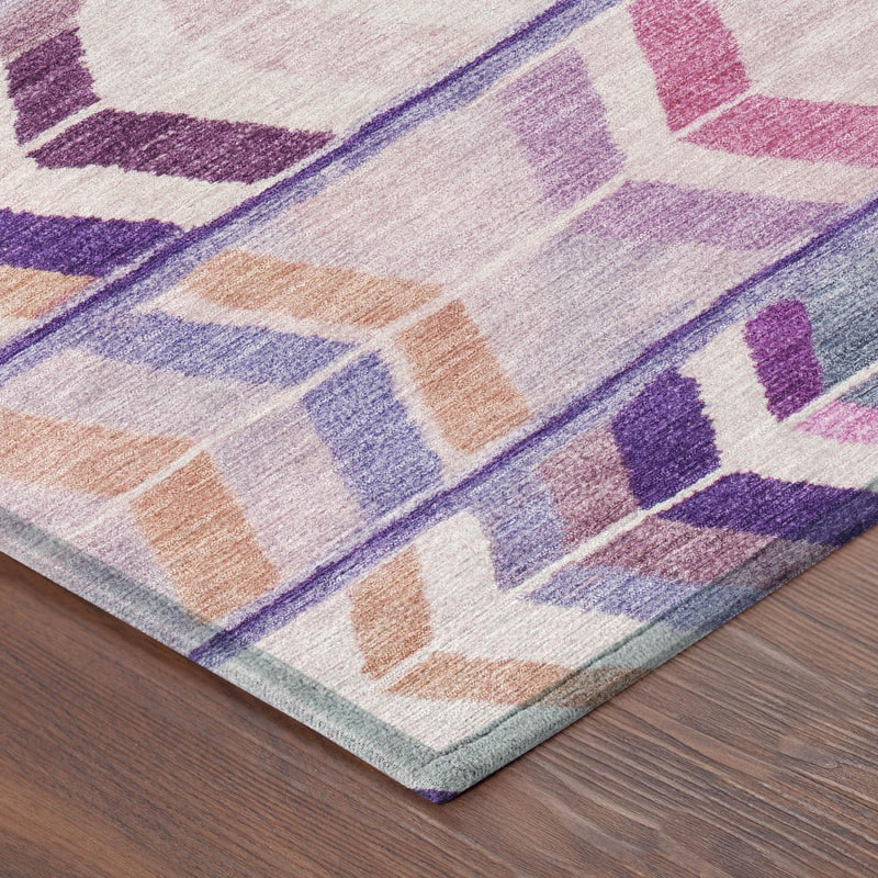 Close-up of purple, lavender, and cream geometric tribal area rug texture
