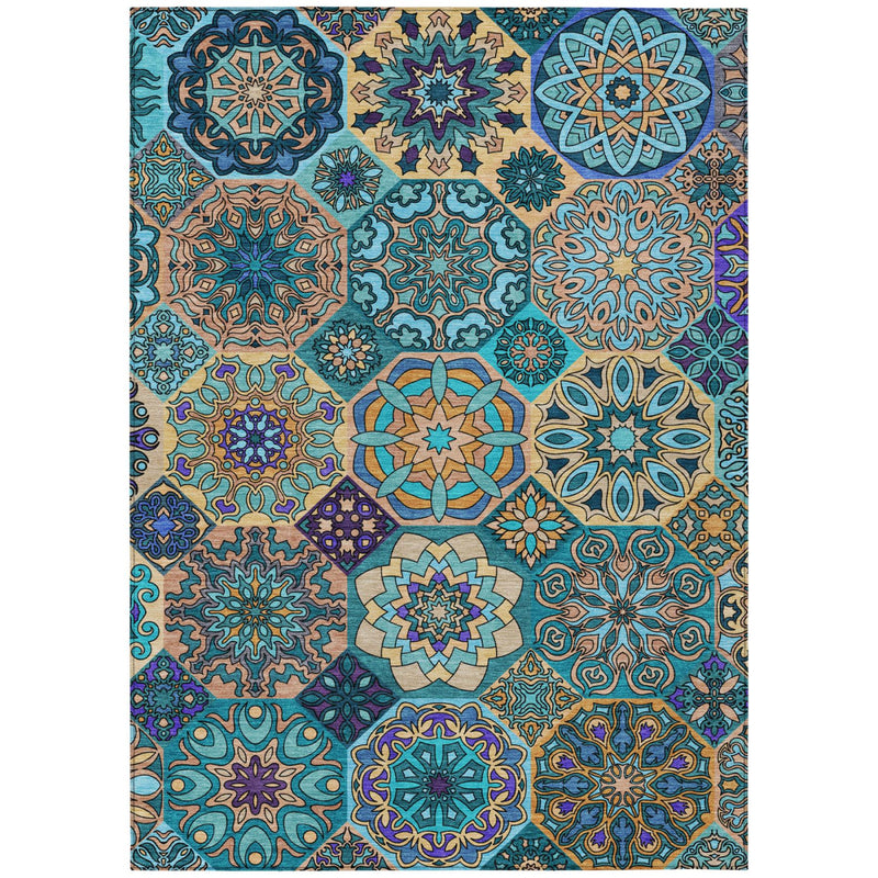 Full view patchwork area rug with teal, turquoise, blue, purple, and cream motifs