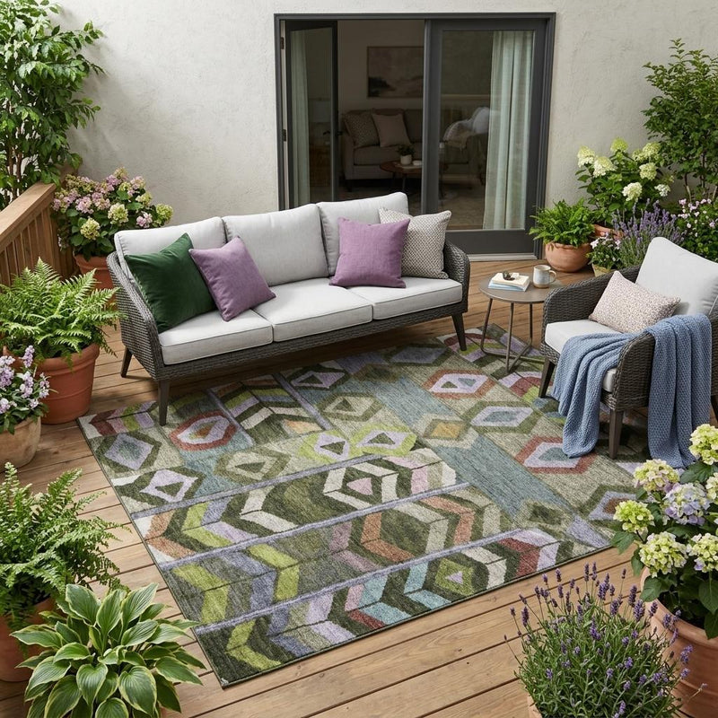 Olive green tribal area rug with geometric diamond pattern on patio floor