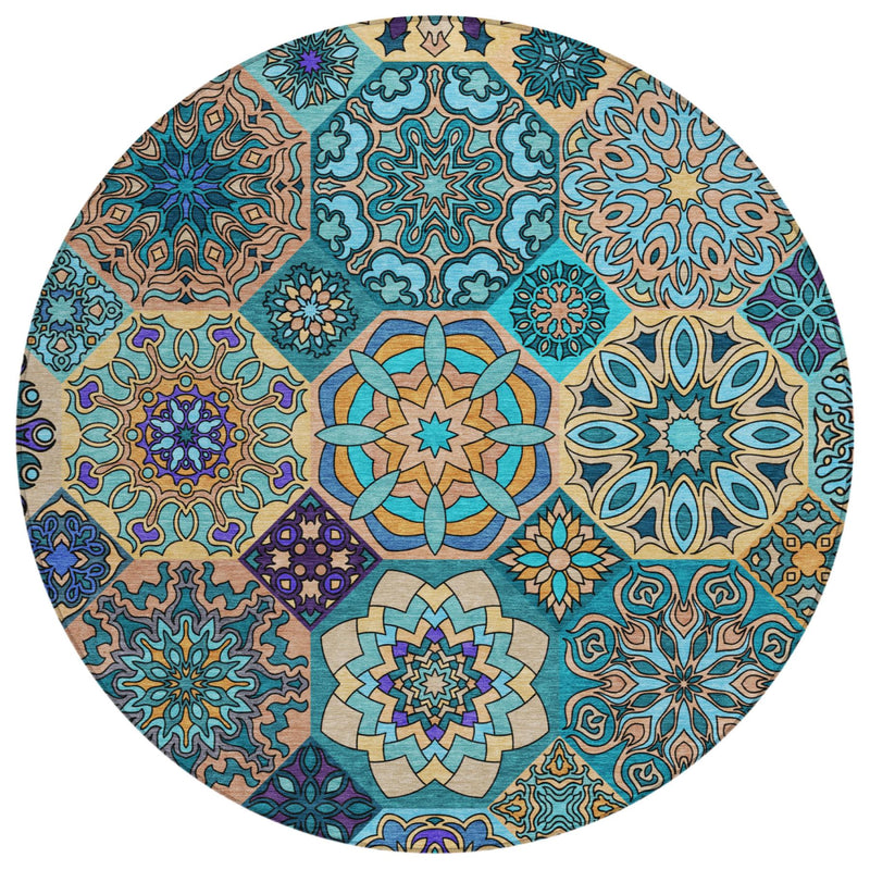 Round area rug with multicolor patchwork floral and star motifs in teal and tan