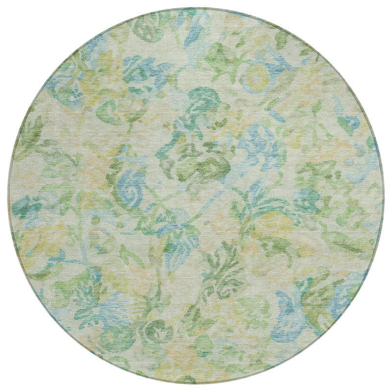 Round area rug in cream with blue, green, and yellow floral and vine design