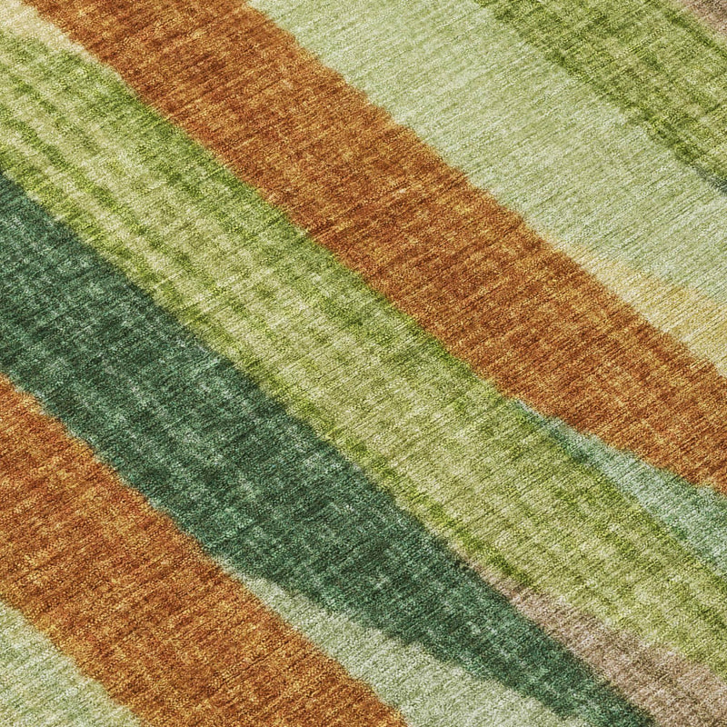 Close-up of rug stripes in green, brown, orange-brown, and cream