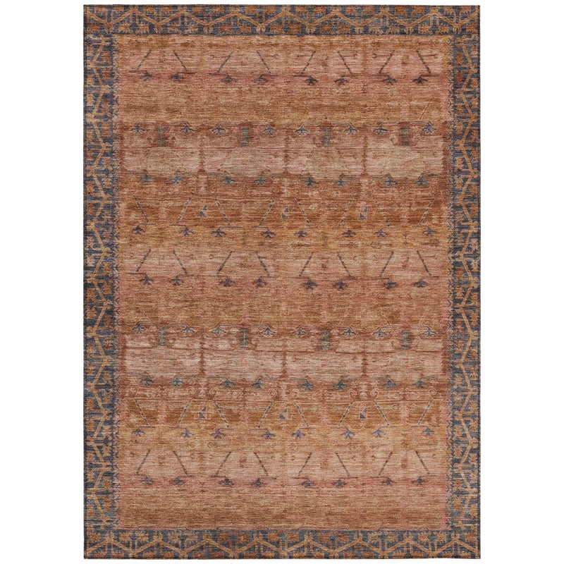 Terracotta area rug with border detail and distressed tribal pattern in blue.
