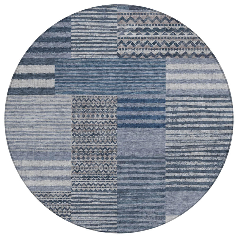 Blue and gray round area rug with vertical stripe and diamond motif panel