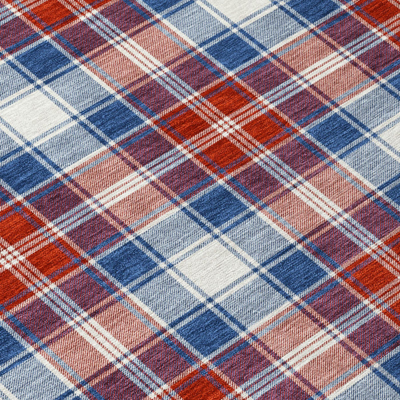 Geometric plaid rug close-up with blue, ivory, and red woven grid lines