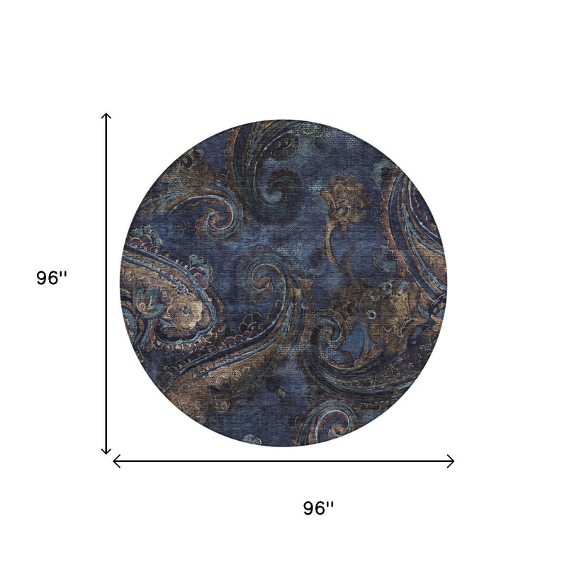 Round paisley area rug, navy blue with beige and teal swirls, 96 in.
