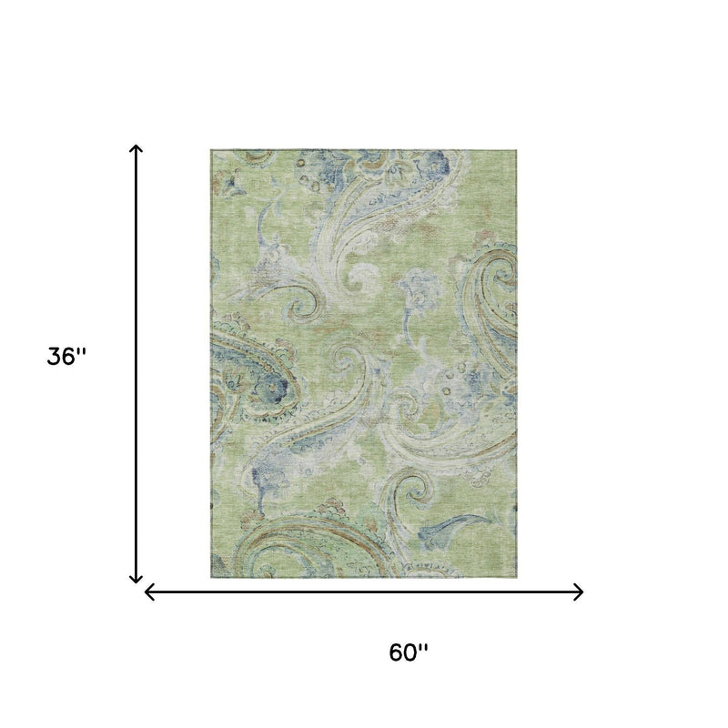 Green and silver paisley area rug shown with 60in x 36in dimensions