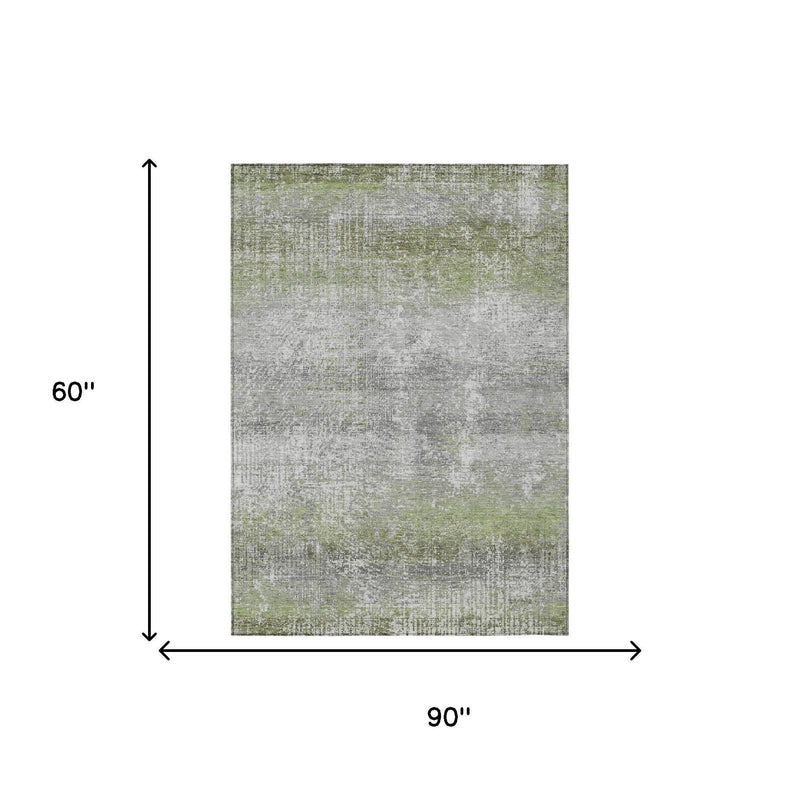 Abstract indoor outdoor rug, 60 x 90 inches, green-gray distressed wash