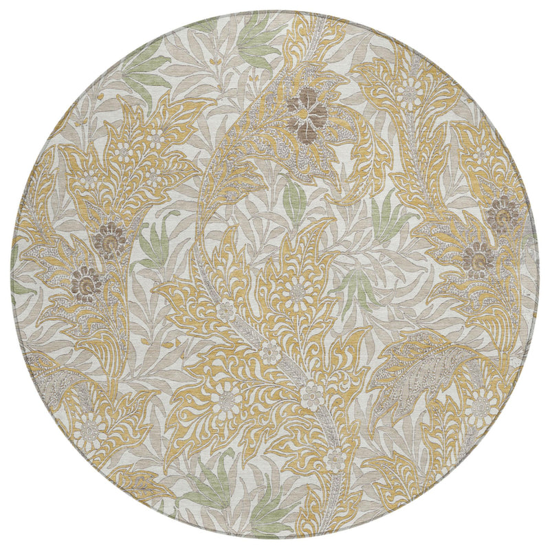 Round botanical leaves area rug with gold and silver foliage on light gray for indoor/outdoor