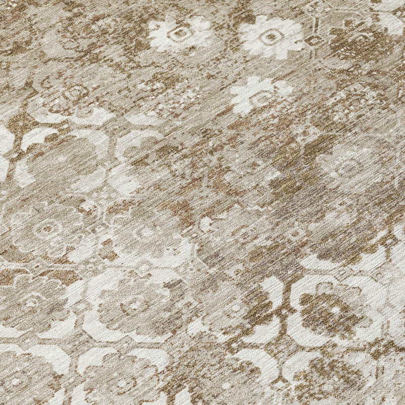 Beige and brown floral medallion area rug close-up with distressed ornamental motif