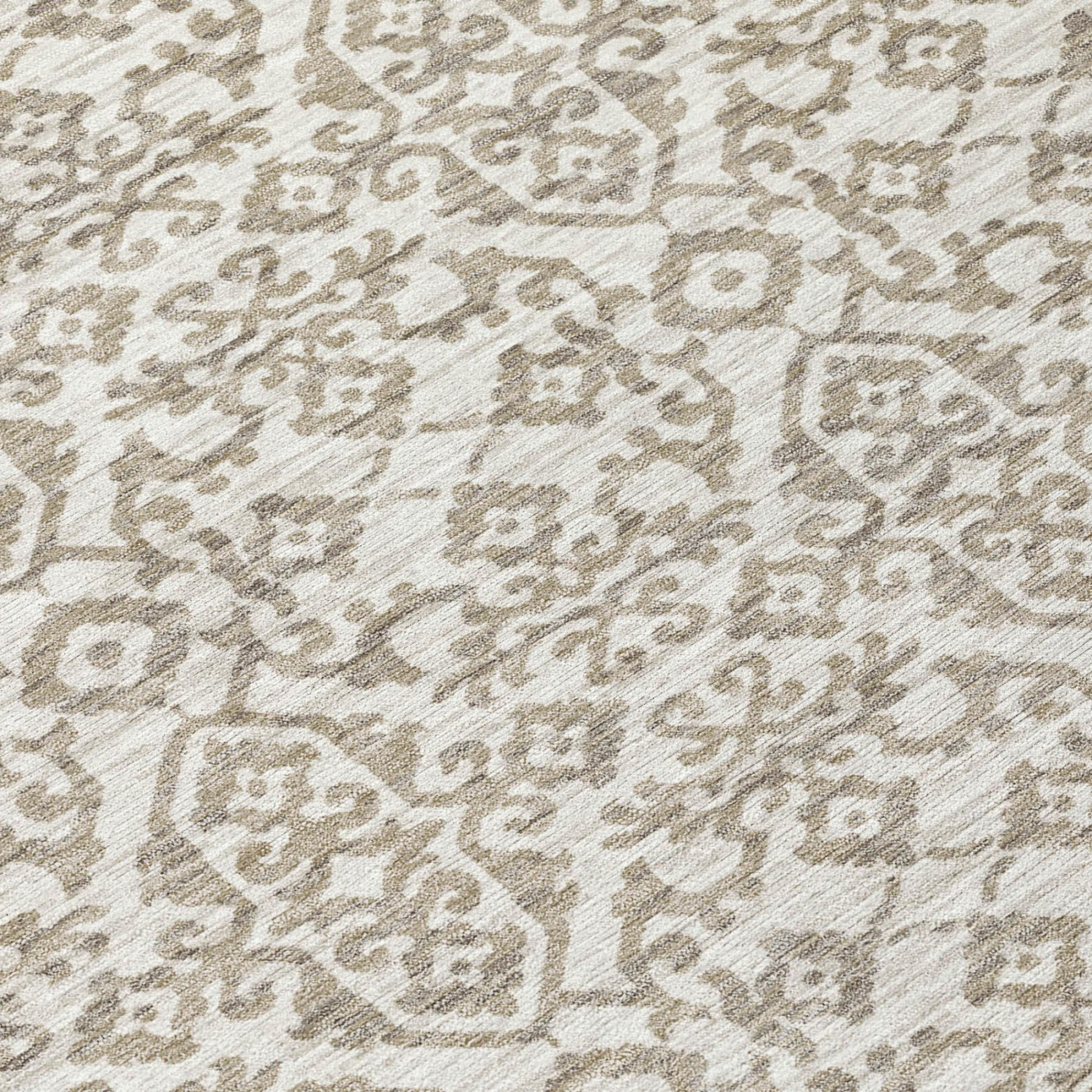 Round area rug close-up, ivory base with beige geometric damask pattern