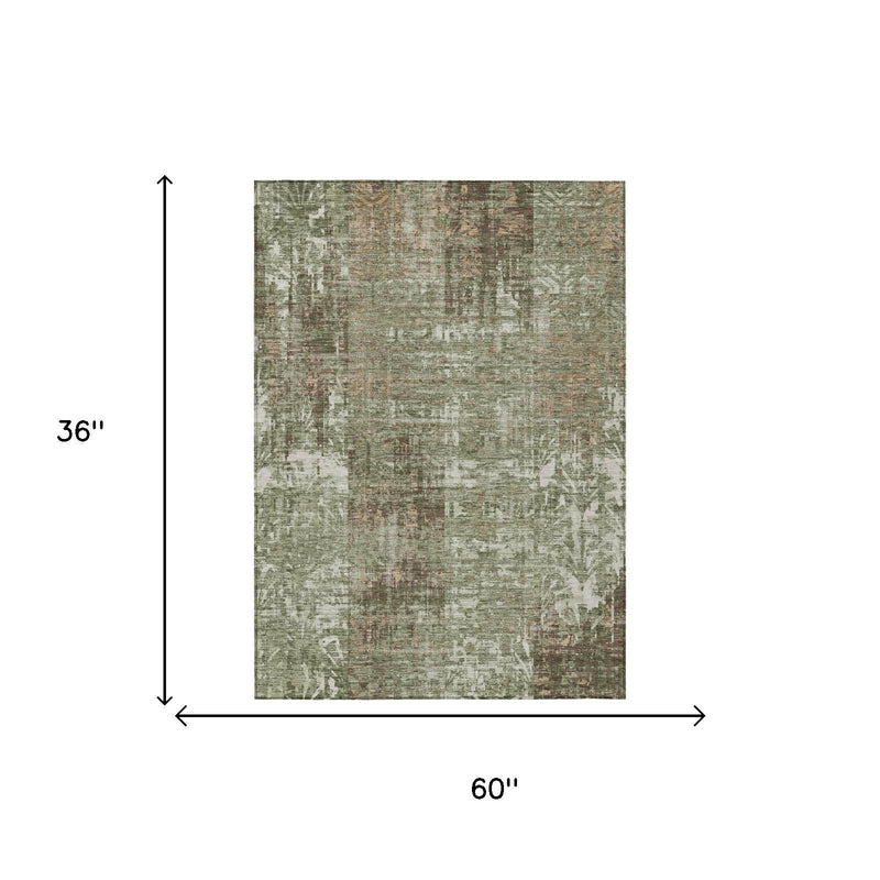 Green abstract area rug dimensions 36 in x 60 in, distressed textured surface