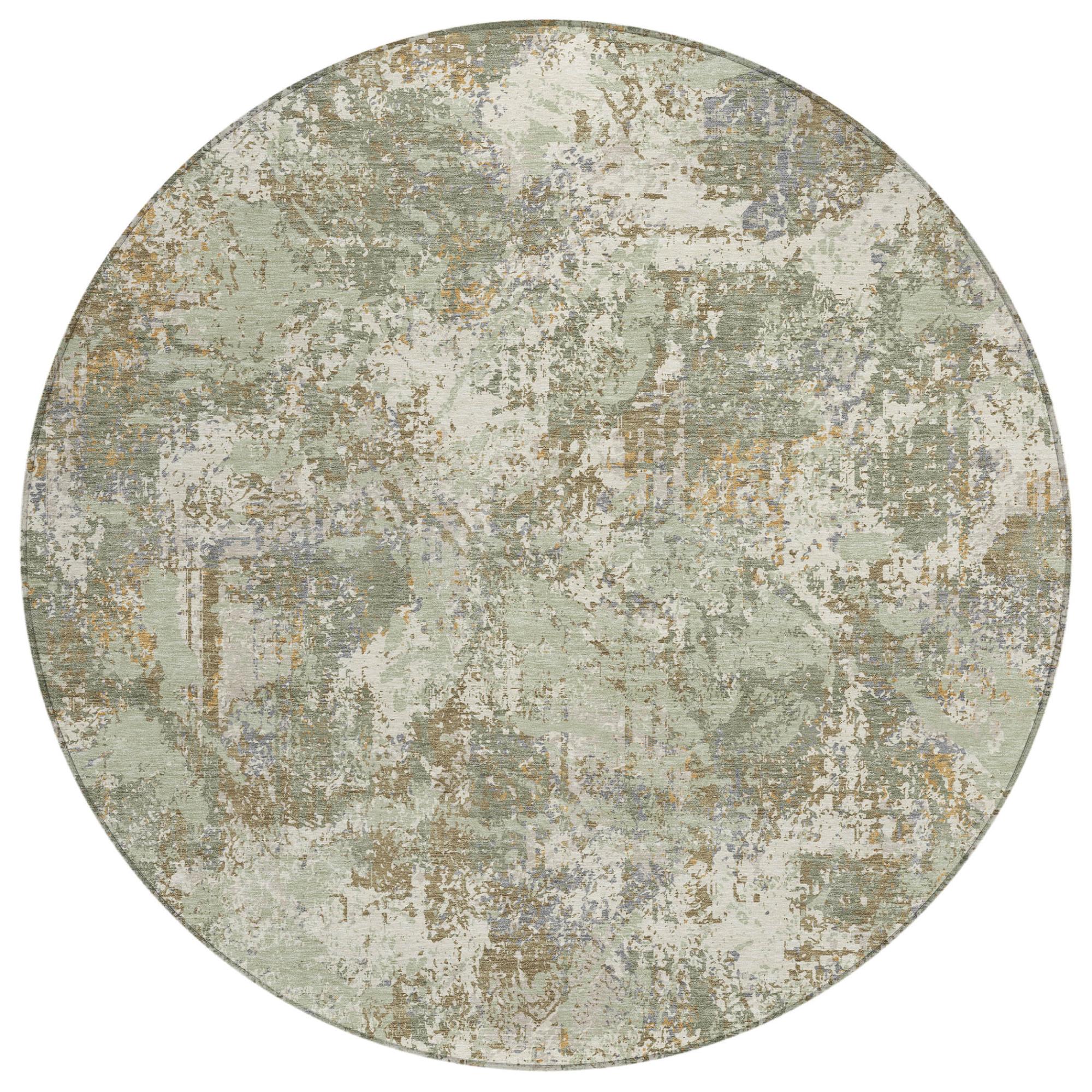 Round abstract area rug in muted green and beige, distressed speckled surface
