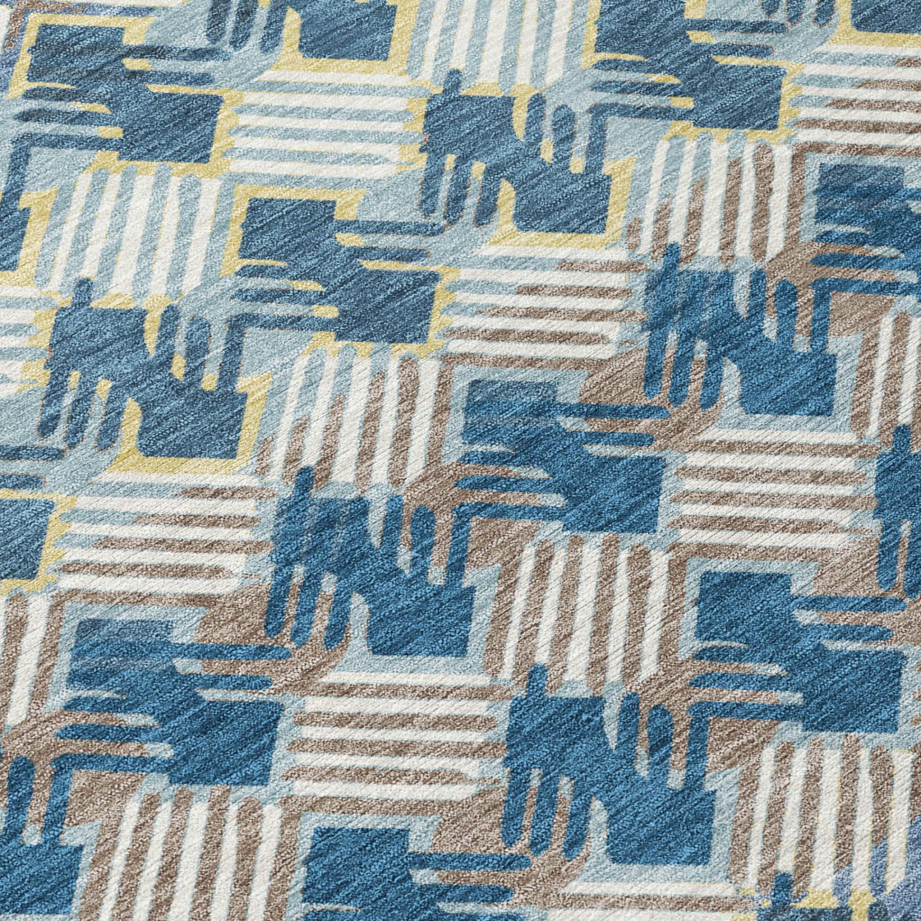 Blue, cream and tan geometric stripe pattern area rug close-up