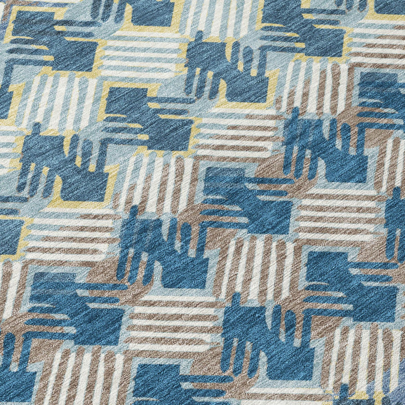 Blue, cream and tan geometric stripe pattern area rug close-up