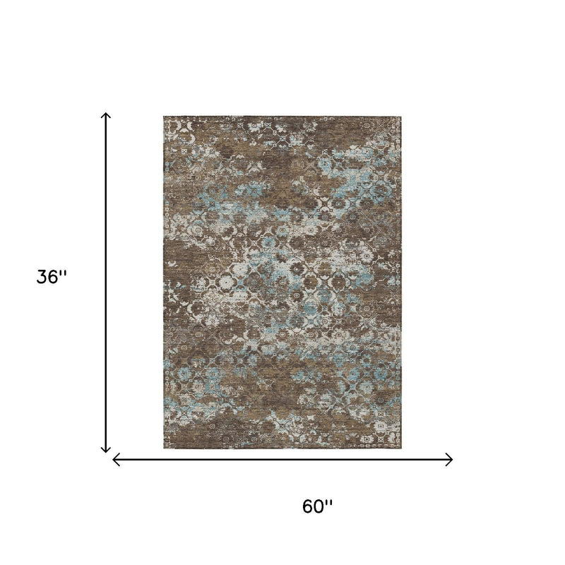 Brown and coffee area rug with light border and blue-gray medallion motifs.