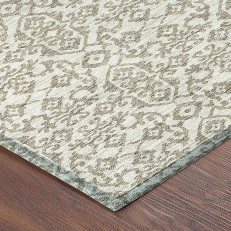 Ivory and beige damask patterned area rug with textured short pile and border
