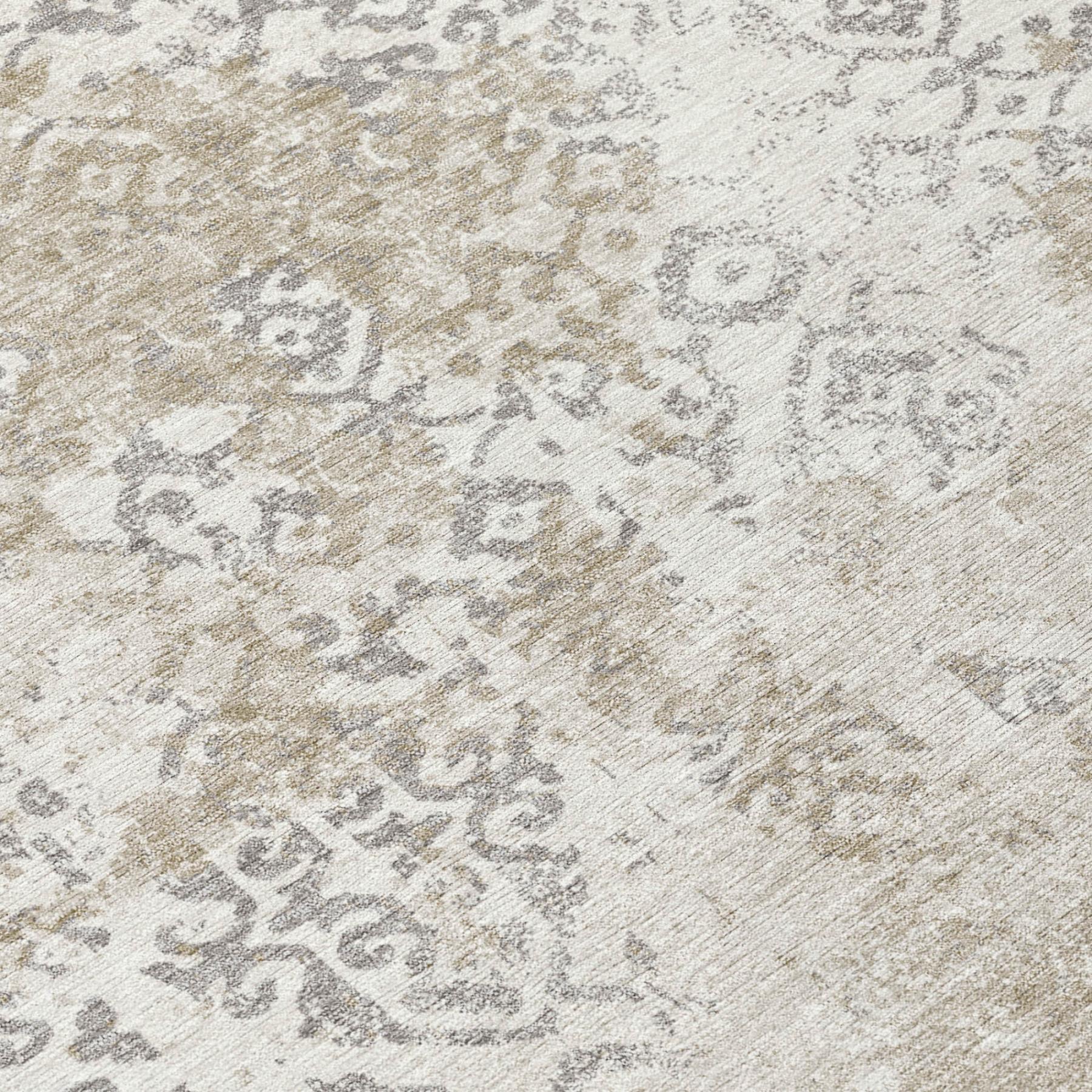 Ivory and silver abstract patterned area rug with distressed, low-pile texture