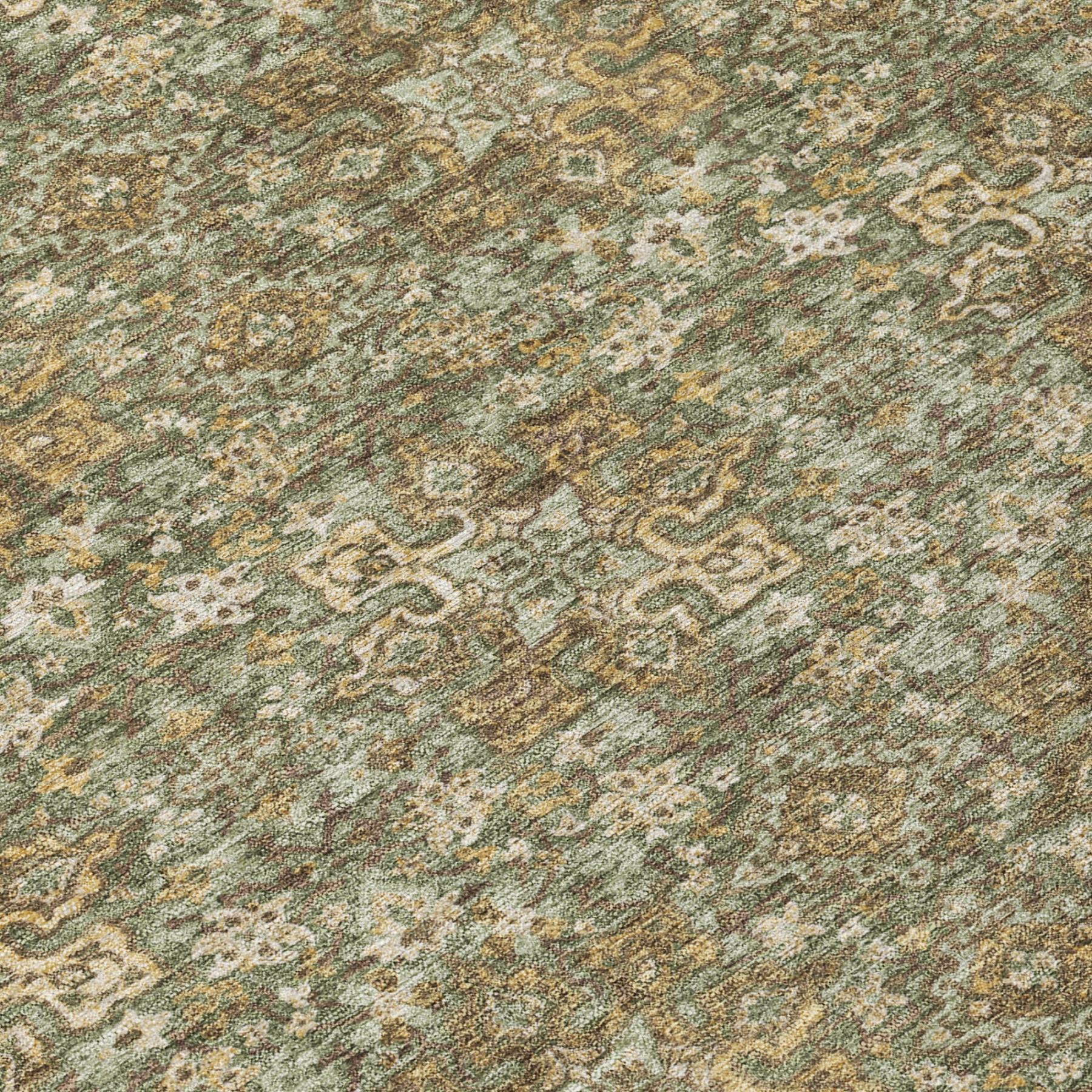 Olive green area rug close-up with cream and tan damask pattern